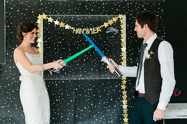 Let's be honest: a Star Wars wedding can be tricky. You want it to be over-the-top fun, but you also run the risk of making it feel like a kids' party. POPSUGAR Tech is here to help! Ahead, check out everything you need — from starry invites to a lightsaber send-off — to keep your big day classy and memorable at the same time.
Photos by Meg Ruth Photo via Green Wedding Shoes