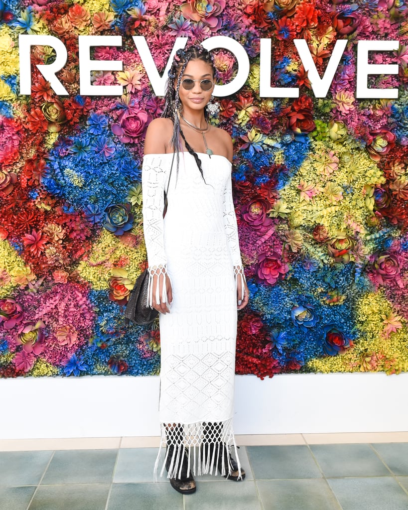 Chanel Iman wearing a crochet off-the-shoulder dress at the Revolve Festival party. 