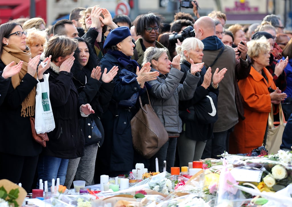 People clapped at the end of a moment of silence in France.