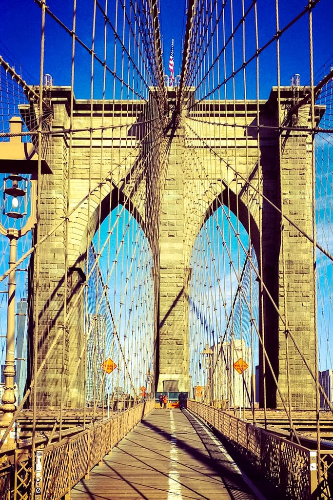Take an early morning stroll along the Brooklyn Bridge
