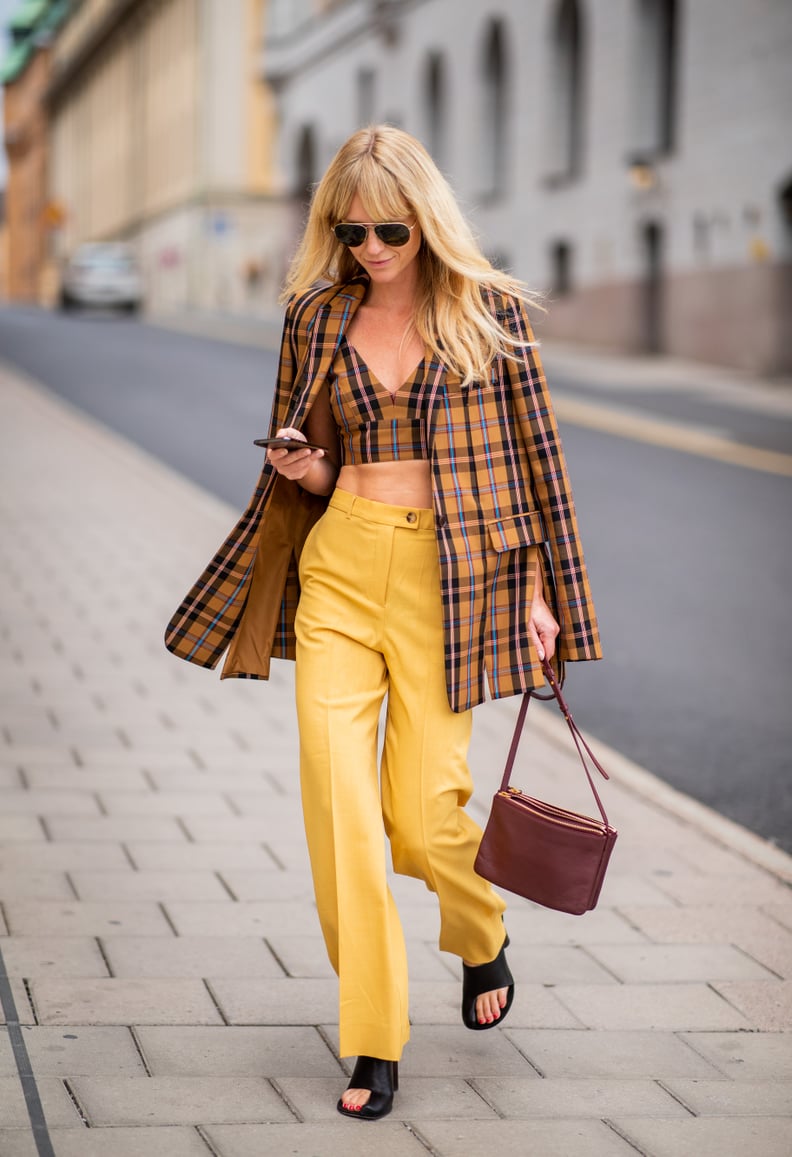 A plaid crop top feels a little less exposed with a coordinating jacket on top.