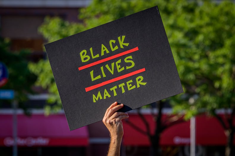 BROOKLYN, NEW YORK, UNITED STATES - 2020/07/31: A participant holding a Black Lives Matter sign at the protest. Brooklynites gathered at Barclays Center for a march in the streets of Brooklyn, demanding justice for all victims of police brutality, bringin