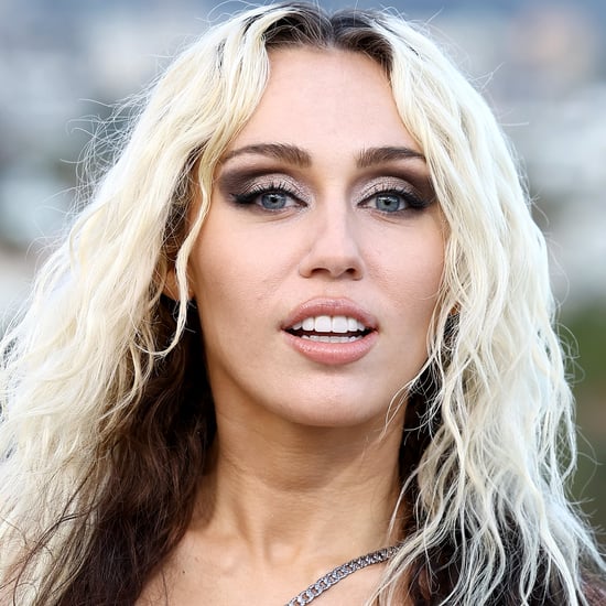 Miley Cyrus's Black Versace Cutout Bodysuit in "Jaded" Video