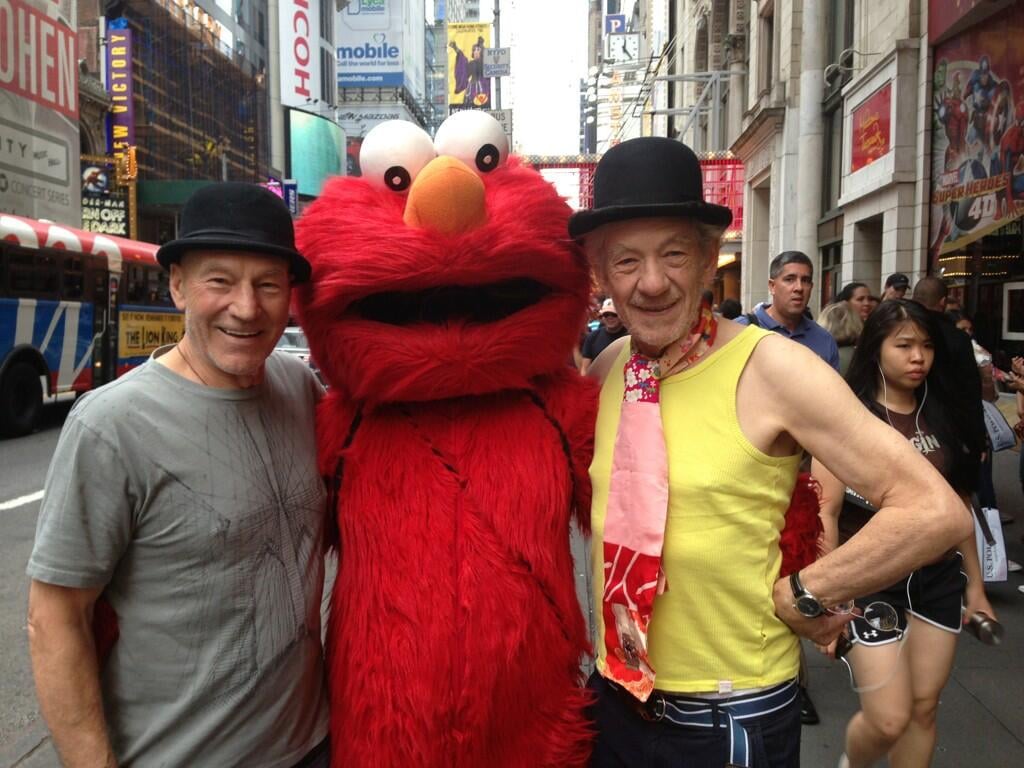 They aren't shy about taking photos with Elmo.