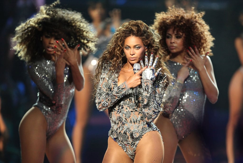 Wearing a sexy silver bodysuit and a metallic Lorraine Schwartz glove while performing "Single Ladies" during MTV's 2009 Video Music Awards.