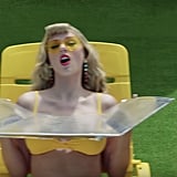 Taylor Swift's Rolled Bangs and Barbie-Pink Lipstick