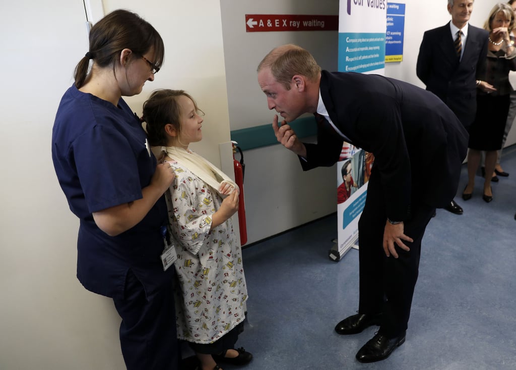 After celebrating World Mental Health Day with Kate Middleton and Prince Harry, Prince William continued his charitable acts by paying a special visit to Basingstoke and North Hampshire Hospital in the UK to focus on providing employment for military veterans. The royal received a warm welcome by the hospital staff upon his arrival, and once inside, William met with several patients, including a 7-year-old girl named Anna Kape, who discussed her missing front tooth and broken arm with him. Later that evening, William attended the MOD Employer Recognition Scheme Gold Awards at London's Royal Hospital Chelsea, where he presented an award and mingled with the Secretary of State for Defense, Michael Fallon. 
Meanwhile, Kate wrapped up her first-ever solo tour since marrying William in the Netherlands. She was given a tour of the garden at Villa Eikenhorst and the At Home in Holland: Vermeer and His Contemporaries From the British Royal Collection exhibition, and hosted a round-table discussion at the British ambassador's residence with two of her charities, the Anna Freud Centre and Action on Addiction.