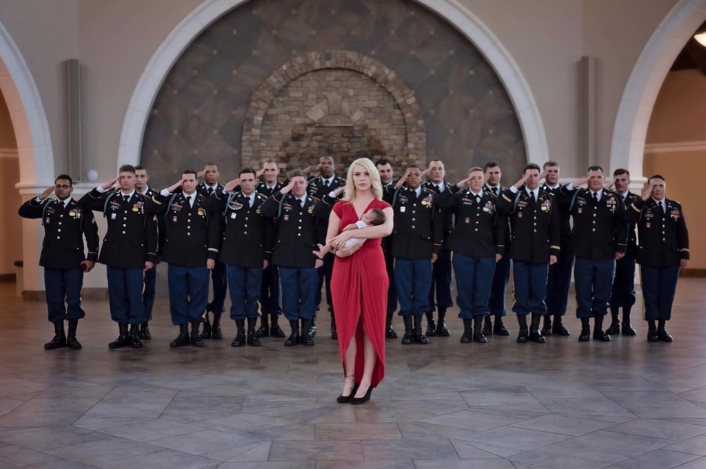 Daughter of Fallen Soldier Photographed With Army Members
