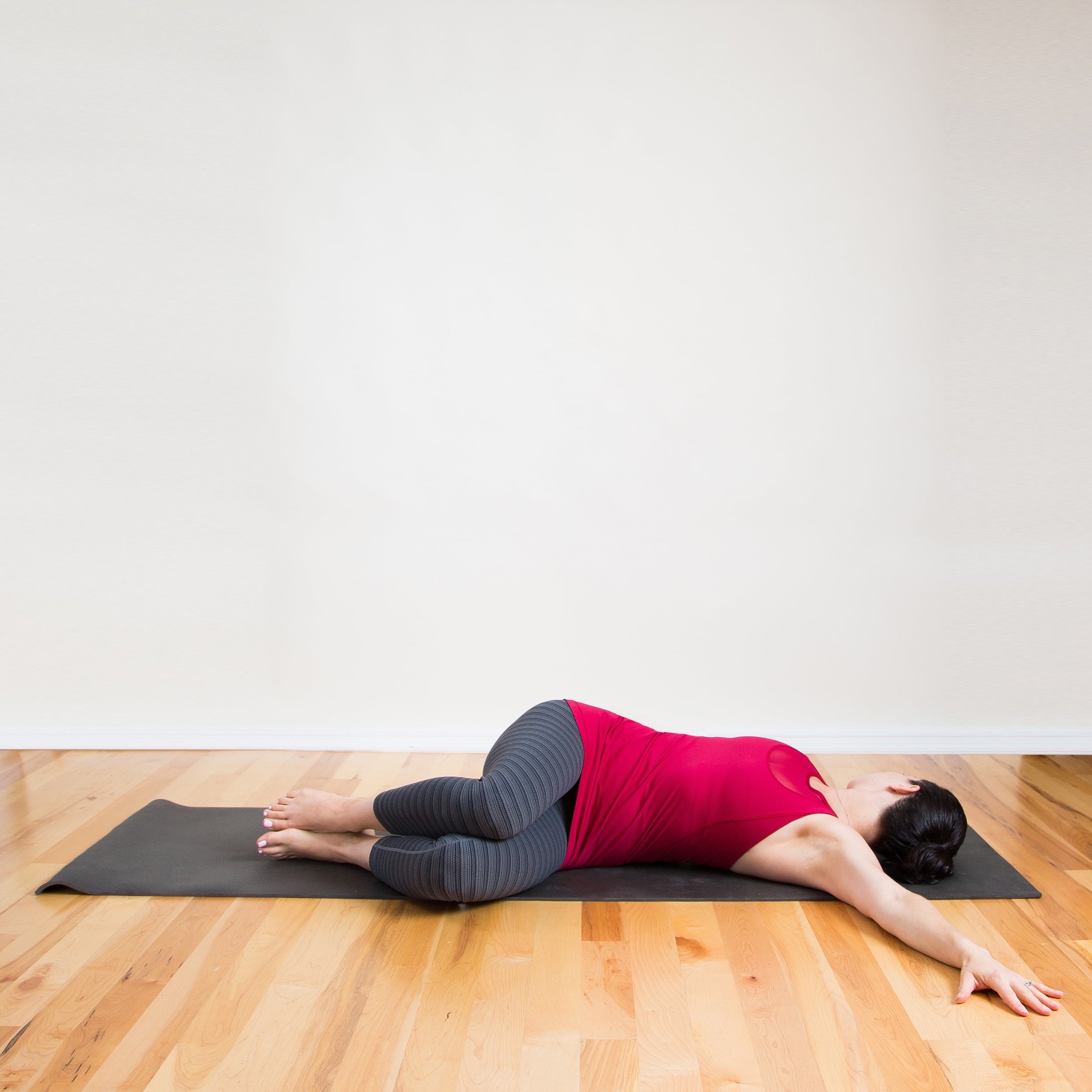 LYING OUTER THIGH STRETCH Lying flat on back, bring leg over and