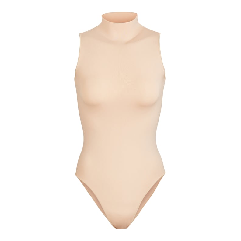 SKIMS Sleeveless Mock Neck Bodysuit in Sandstone