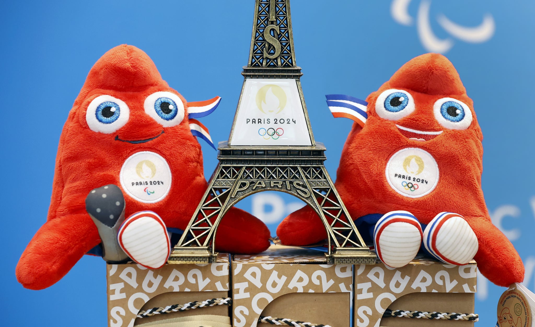 A replica of the Eiffel Tower with the logo of the 2024 Olympic Games surrounded by official mascots for the Paris 2024 Summer Olympic and Paralympic Games is displayed inside the official store entirely dedicated to the 2024 Olympic Games