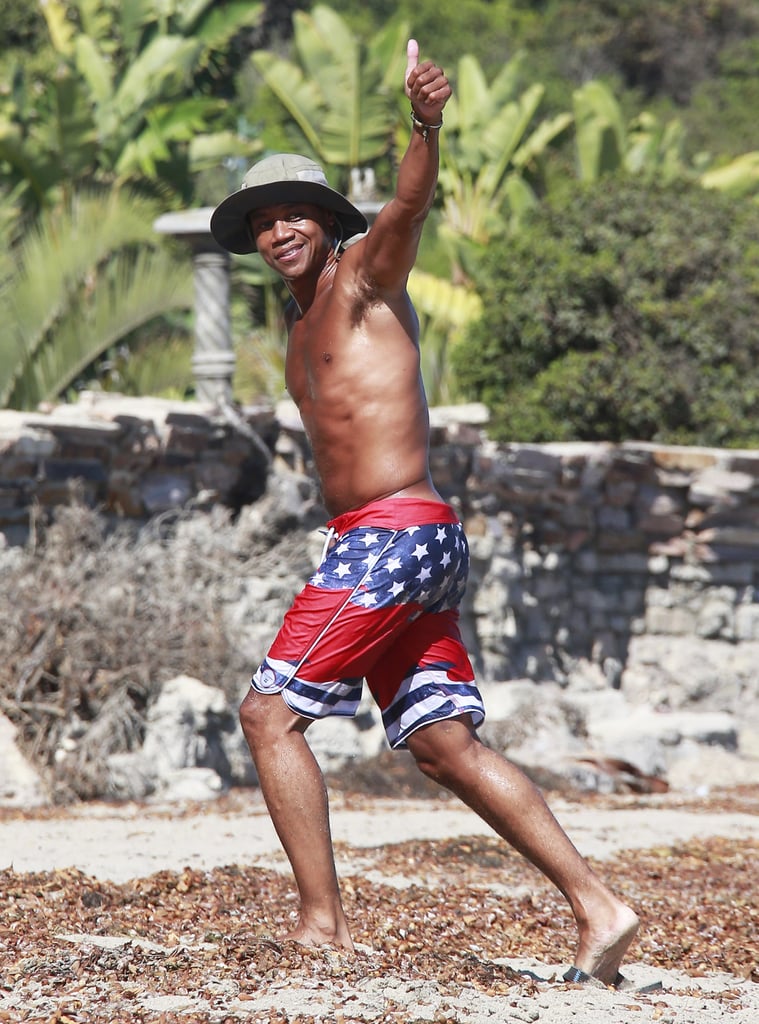 Cuba Gooding Jr. wasn't shy about showing off his beach body when he hit the sand in Malibu, CA, on Labor Day. The actor, dressed in patriotic board shorts, played around with photographers and even flashed part of his bare bum. Cuba looked like he was having a fun time over the holiday weekend, but he has been hard at work over the past few months. He is currently filming Selma, a movie centered on the civil rights marches in the South during the '60s, alongside Common, Oprah Winfrey, and Orange Is the New Black's Lorraine Toussaint. Keep scrolling to see Cuba's beach day, but be forewarned — there are some NSFW butt shots. Speaking of shirtless stars, don't forget to play our annual Shirtless Bracket to help name the male celebrity with the hottest body!