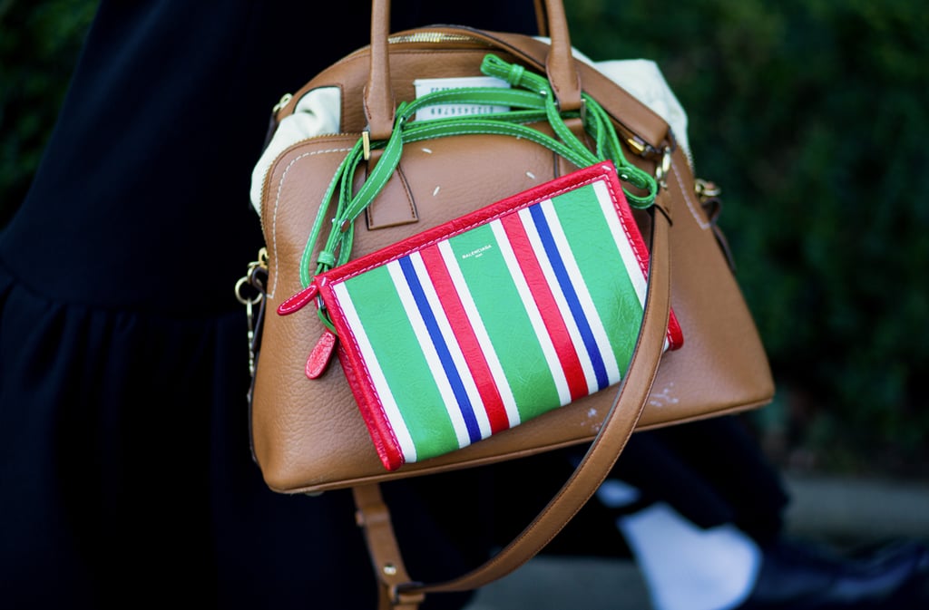 Wrap the rope of your crossbody around the handles of your tote.