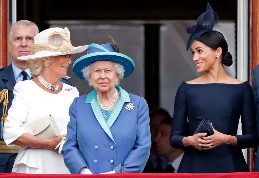 Camilla and Meghan chatted alongside Queen Elizabeth on the Buckingham Palace balcony during the July centenary parade, marking the 100th birthday of the Royal Air Force.