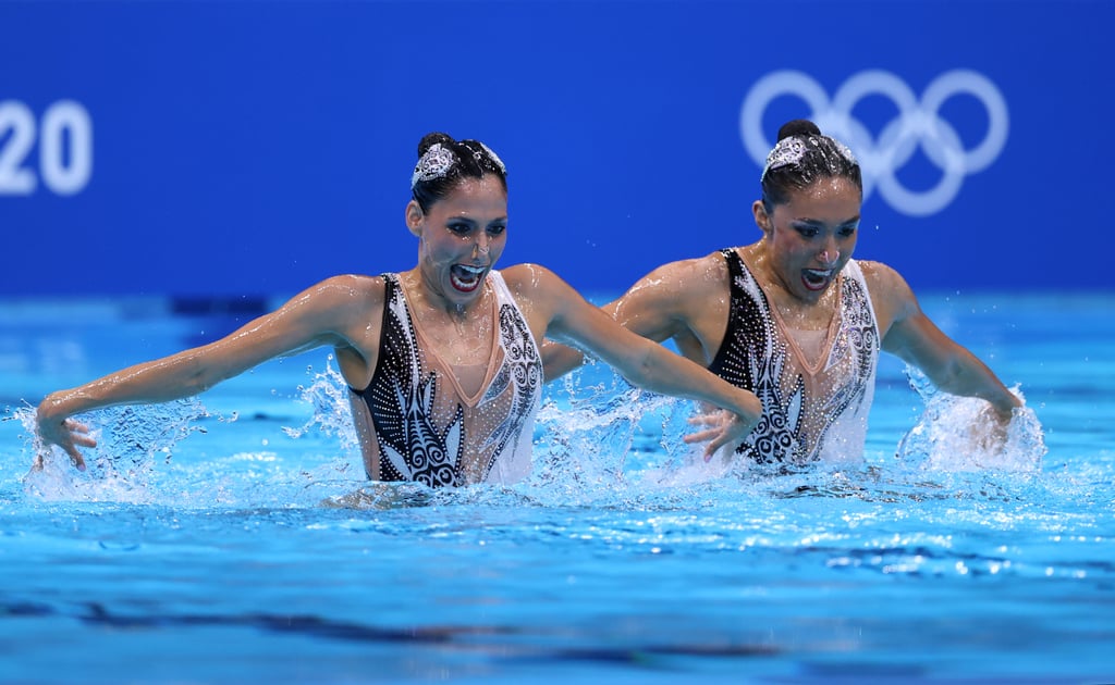 Olympic gymnasts aren't the only ones with a dazzling sense of style. On Aug. 2, day 10 of the Olympic Games, Mexican synchronized swimming duo Nuria Diosdado and Joana Jiménez García pulled out all the stops with their embellished leotards, which included a subtle but heartfelt nod to one of our favorite early 2000s TV shows: Avatar: The Last Airbender. 
The black and white sheer outfits, designed by Mexican brand Gilling Activewear, each featured the koi fish Tui and La, known respectively as the moon spirit and fish spirit in the Nickelodeon show. In the season one finale of the cartoon, it's revealed that Tui and La, like the ancient Chinese philosophy of yin and yang, maintain balance on earth with their "eternal dance of push and pull." Just like the koi fish, the duo demonstrated an elegant harmony with their mesmerizing underwater routine, making their outfits fun and fitting for the competition. 
As if their looks weren't gorgeous enough, the back of Diosdado and Jiménez García's outfits show the four elements — water, earth, fire, and air — stylized as they are in the TV show and covered in rhinestones. Short of actually making water float around the room, we're convinced this is proof that they're both secretly waterbenders. So, yeah, we think Aang and the "gaang" would be highly impressed. See if you can spot the Avatar: The Last Airbender refrences from all angles ahead. 

    Related:

            
            
                                    
                            

            IMO, These 2021 Olympics Fashion Moments All Deserve a Medal