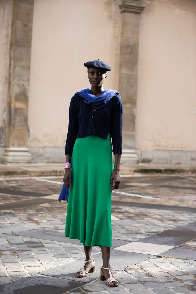 Though navy might technically be a color, it acts as very much a neutral when matched atop a brighter green hue.