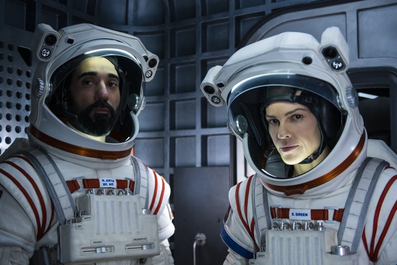 AWAY (L to R) RAY PANTHAKI as RAM ARYA and HILARY SWANK as EMMA GREEN, in episode 109 of AWAY. Cr. DIYAH PERA/NETFLIX  2020