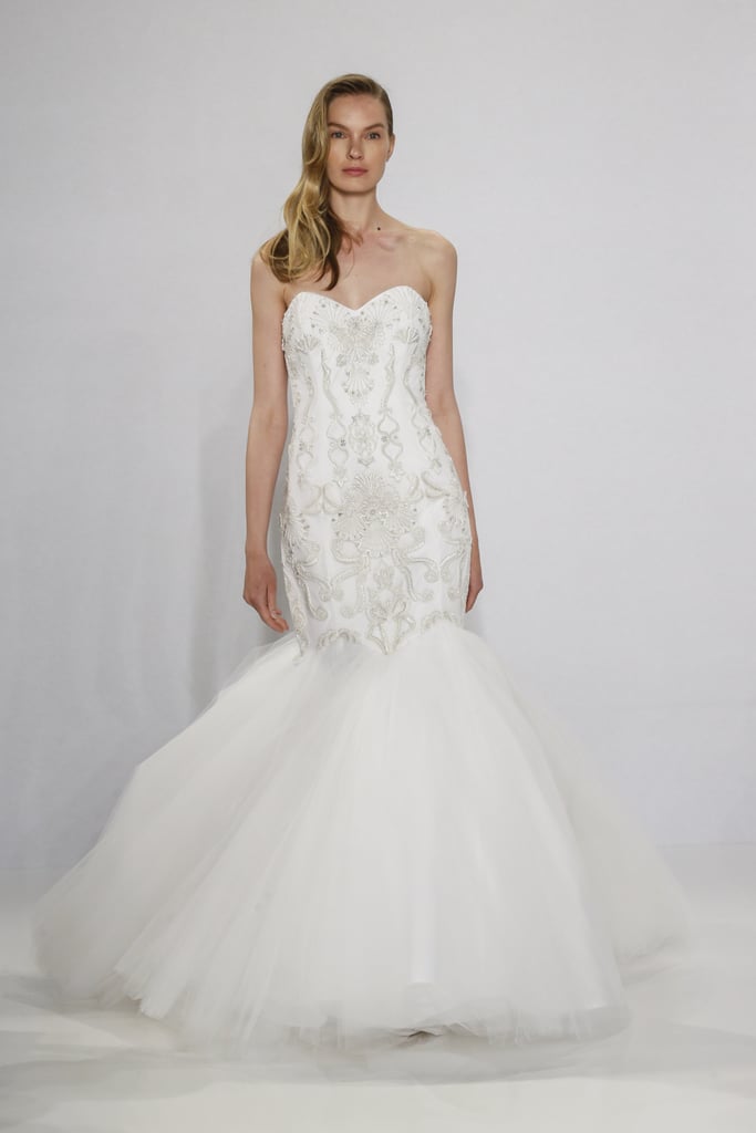 Embroidered strapless mermaid gown.