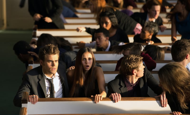 Elena's even prepared for havoc to break loose in a church.