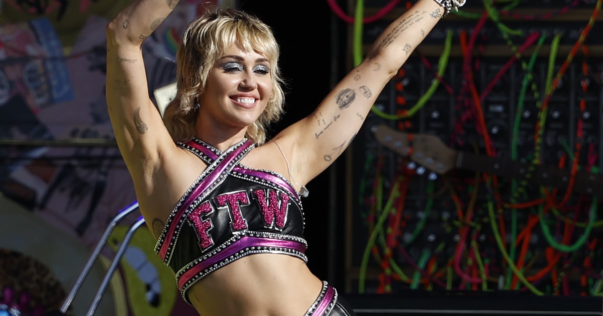 Miley Cyrus's Super Bowl Outfit Comes With Pink Metallic Knee Pads, Because She Rocks Hard