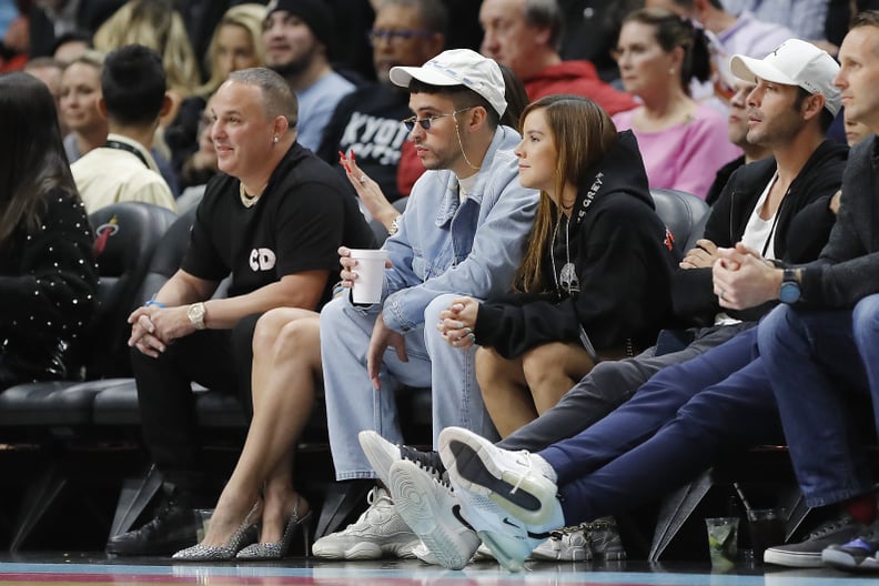 MIAMI, FLORIDA - FEBRUARY 28:  Music artist Bad Bunny looks on during the first half between the Miami Heat and the Dallas Mavericks at American Airlines Arena on February 28, 2020 in Miami, Florida. NOTE TO USER: User expressly acknowledges and agrees th
