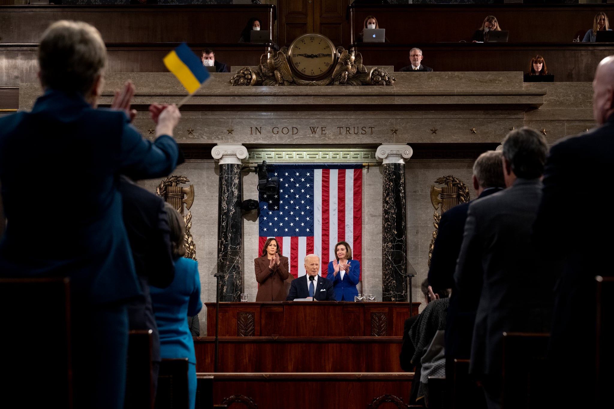 WASHINGTON, DC - MARCH 01:  A member of the U.S. Congress waives a Ukrainian flag as President Joe Biden delivers the State of the Union address to a joint session of Congress in the U.S. Capitol House Chamber on March 1, 2022  in Washington, DC. In his first State of the Union address, Biden spoke on his administration's efforts to lead a global response to the Russian invasion of Ukraine, work to curb inflation, and bring the country out of the COVID-19 pandemic. (Photo by Saul Loeb - Pool/Getty Images)