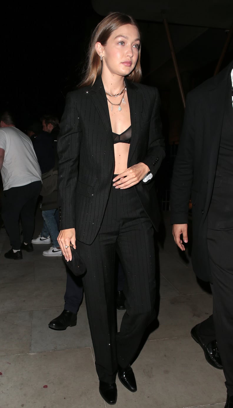 Gigi Hadid Wearing a Black Suit and Bra in London