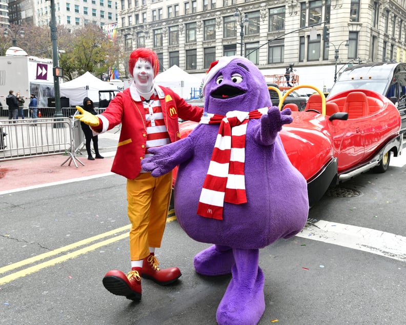 NEW YORK, NEW YORK - NOVEMBER 24: Ronald McDonald (wearing face shield) and Grimace appear in the 94th Annual Macy's Thanksgiving Day Parade¨ on November 24, 2020 in New York City. The World-Famous Macy's Thanksgiving Day Parade¨ kicks off the holiday sea