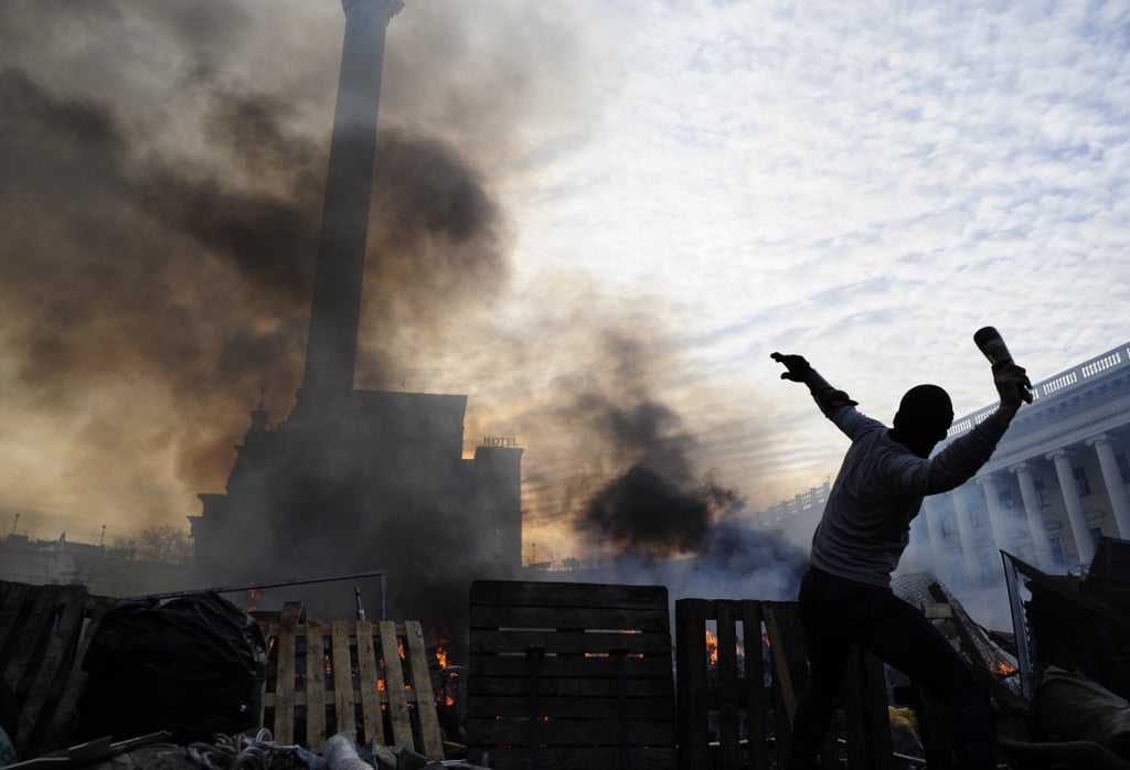 Smoke billowed above the square.