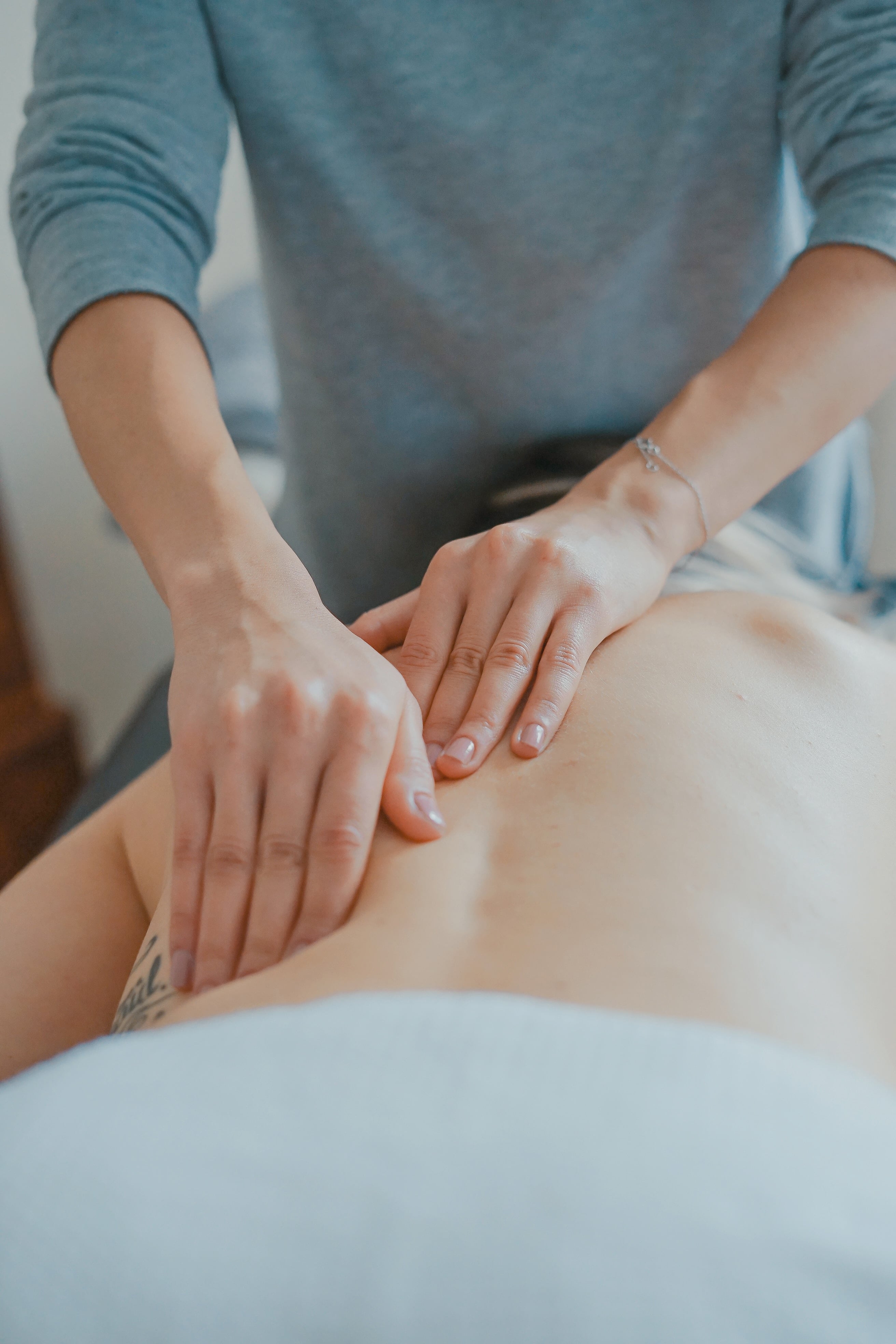 SPA and health. Manual back massage. A man on a massage couch