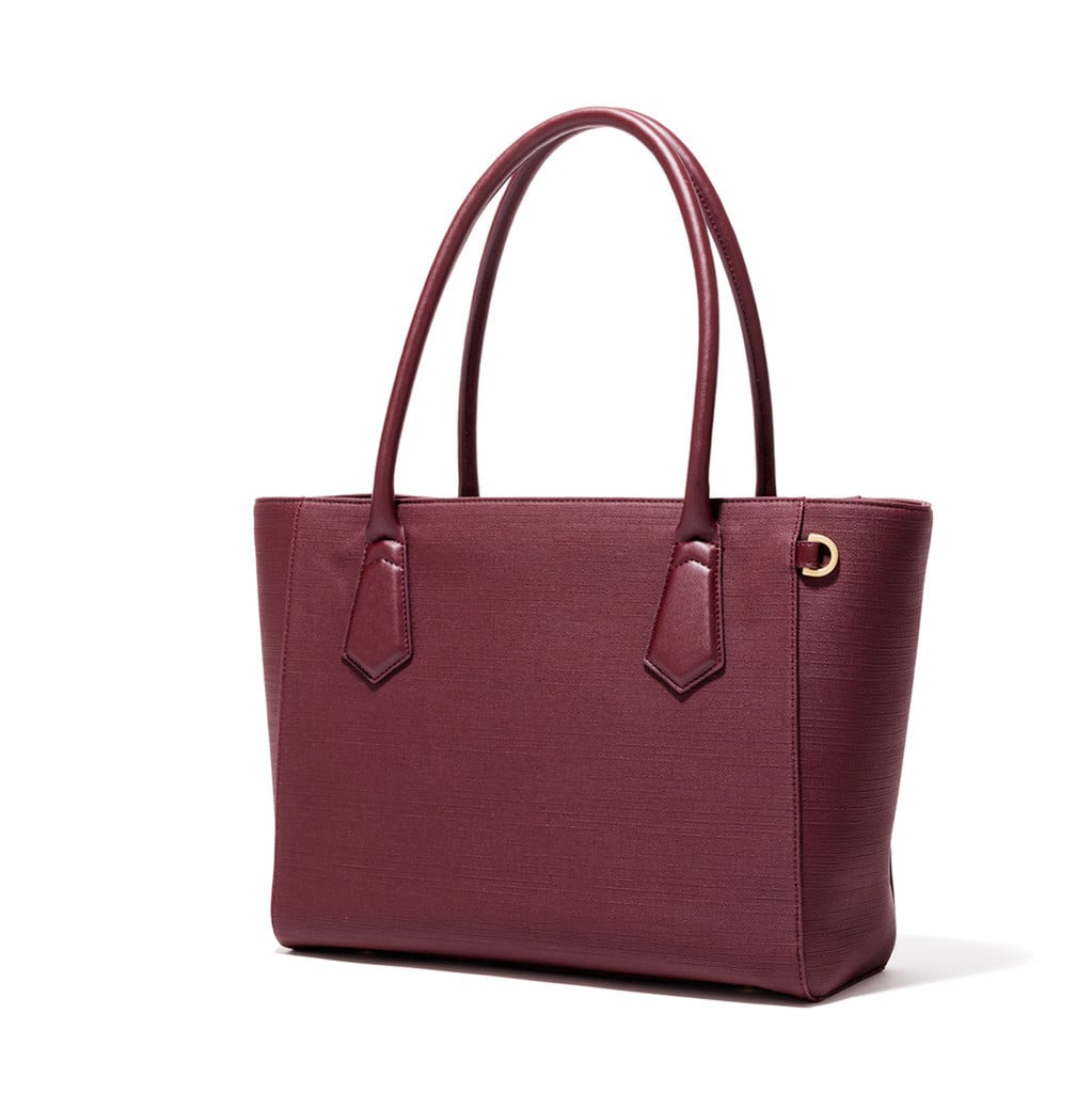 This Dagne Dover tote ($255) is the work-to-happy-hour carryall I’ve been searching for! It just has so many compartments, is roomy enough to fit all my stuff, and comes across as elevated rather than your typical, bulky “laptop bag.”	
— SS