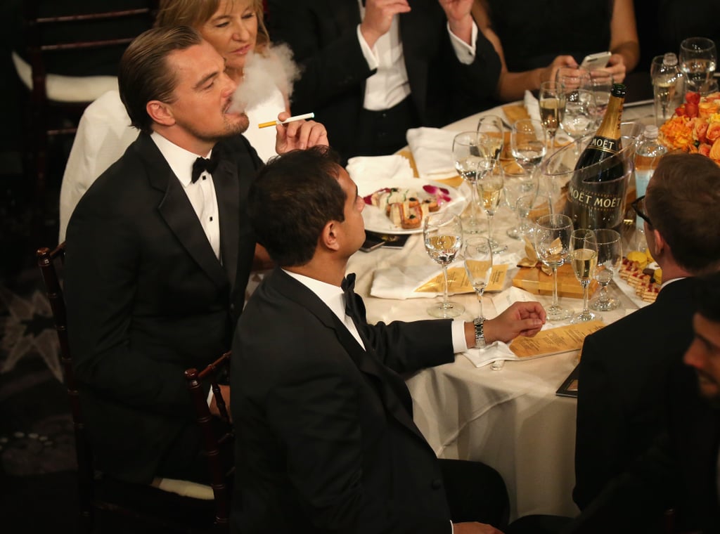 Leonardo DiCaprio lit up an electronic cigarette at his table, where he sat with the rest of his The Wolf of Wall Street cast. 
Source: Christopher Polk/NBC/NBCU Photo Bank/NBC