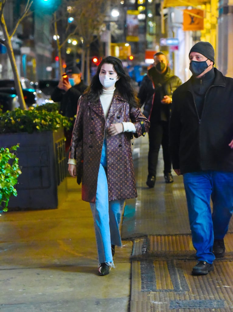 Selena Gomez Wearing Logo-Covered Louis Vuitton Coat in NYC