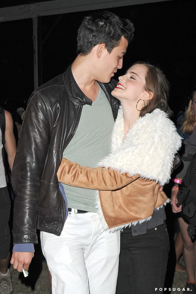 Emma Watson and her man cuddled up during a show in 2012.
