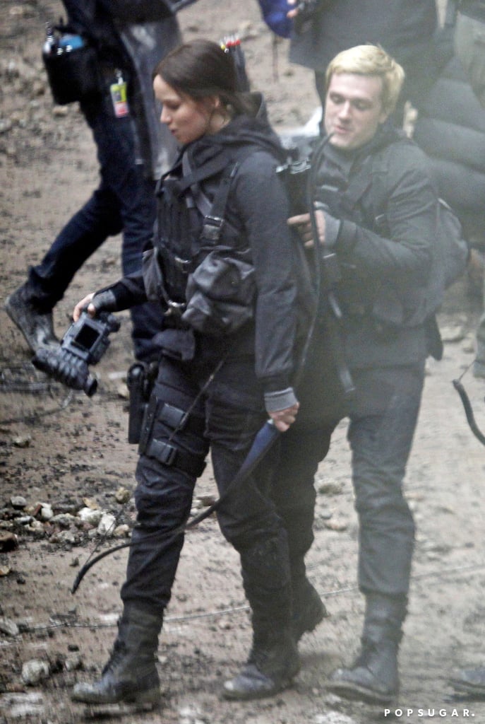 Hutcherson helped Lawrence with her gear.