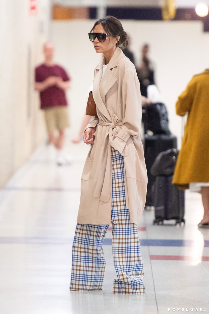 Victoria Beckham in Trench Coat and Plaid Pants | POPSUGAR Fashion Photo 2