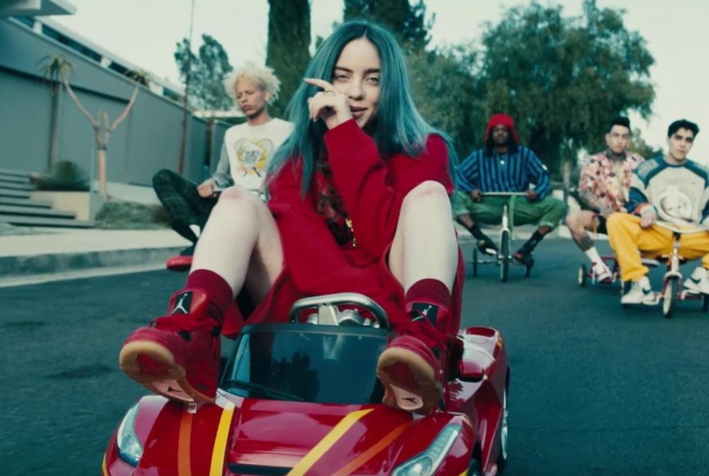 1. Billie Eilish's iconic blue hair and outfit from her "Bad Guy" music video - wide 2