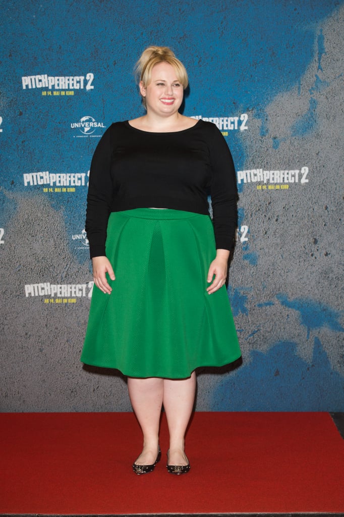 Rebel paired her kelly green pleated Eloquii midi skirt with eye-catching embellished black flats and a simple long-sleeve Eloquii sweater. Her look was movable, comfortable, and most importantly, fun.