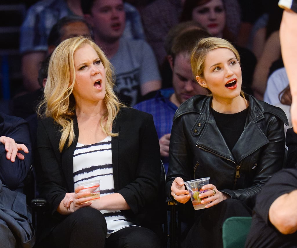 Amy Schumer and Dianna Agron were both perplexed by a play at an LA Lakers game in March 2014.