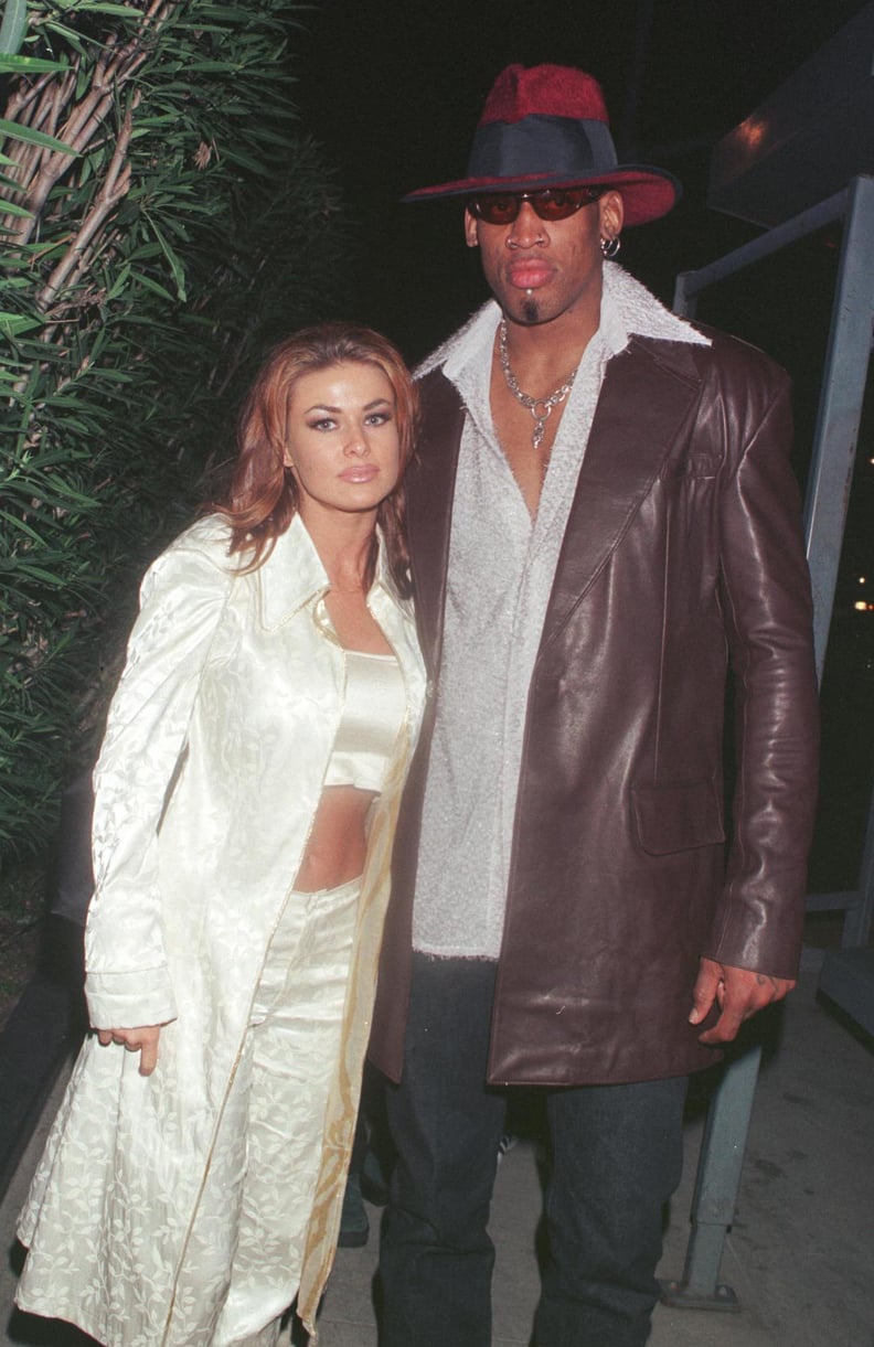 2/26/99 Beverly Hills, CA. New Laker Dennis Rodman celebrates his first winning game out on the town at GOODBAR with wife Carmen Electra.