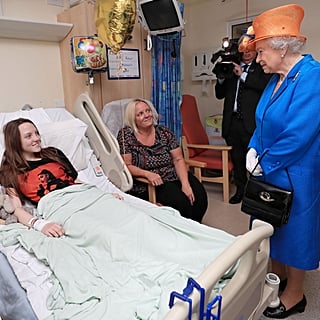 Queen Elizabeth Pays a Special Visit to the Bombing Victims