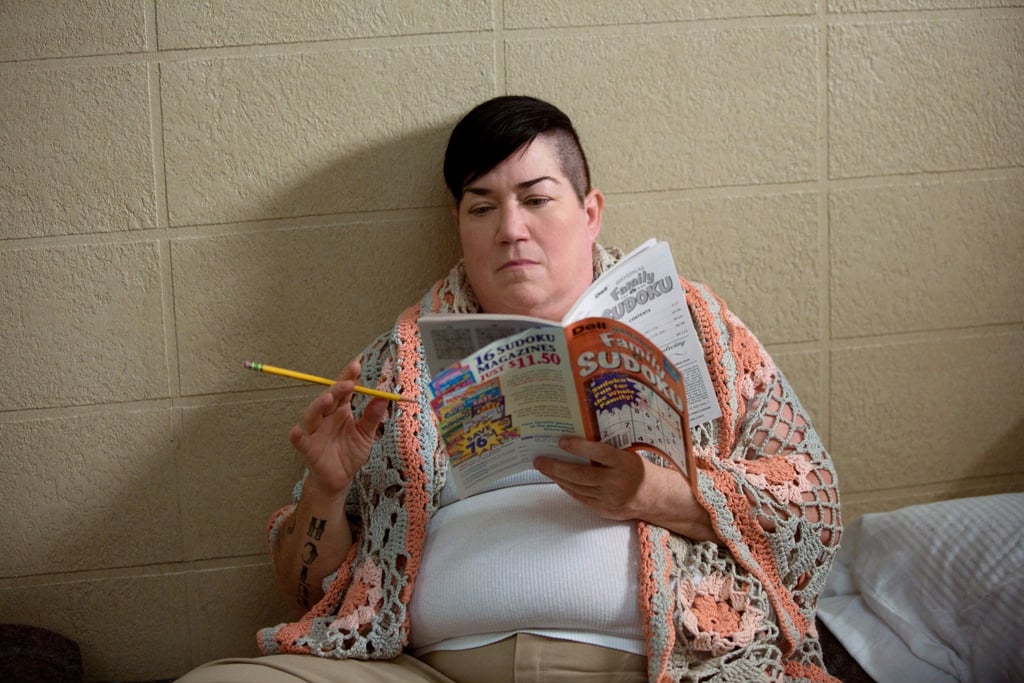 POPSUGAR: It always seems like the cast has such a blast on set, and that you guys are all really close friends in real life. What is it like for new actors, like Blair Brown
(who plays Judy King), to come in?
Taryn Manning: We love Blair! She's a great woman.
Lea DeLaria: What an asset she was to the set, and to the entire cast.
TM: It's hard to come into that set.
LD: Right? We're tight-knit. We're a family, so it's rough to come into this group of people who are set in their ways and already have this thing. But, you know? That's the thing about Blair. She's been around a long time, she doesn't give a f*ck, she sits down, and she joins the party.
TM: She's a great actor.
LD: Yeah, amazing.
PS: Does being so tight-knit have an affect on your acting process?
TM: I've often wondered – and this might be my own conspiracy, because I have those – that sometimes maybe we're too close. We're all friends, so if you're not a great actor, it can come off like we're too chummy. I think it's written in a way to keep us divided. Not in real life, but to make sure that it's understood that in prison, not everyone gets along. You do fight for the stupidest little things, like a cigarette or the phone.