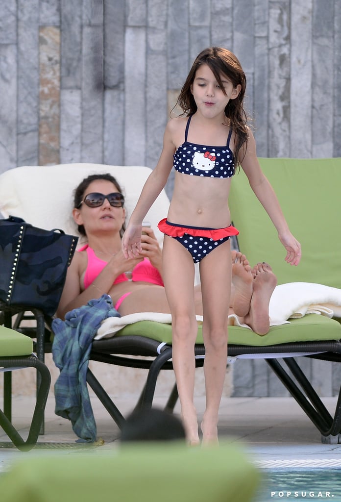 Katie Holmes and Suri Cruise hit the pool in Miami ahead of the New Year.