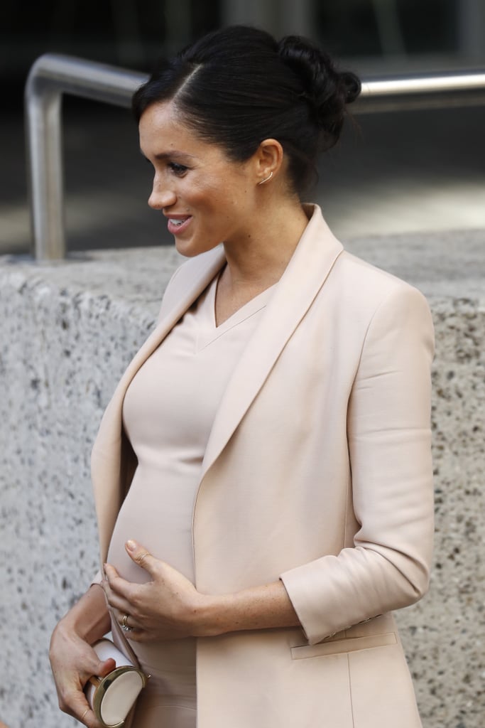 Meghan Markle Touching Baby Bump Pictures