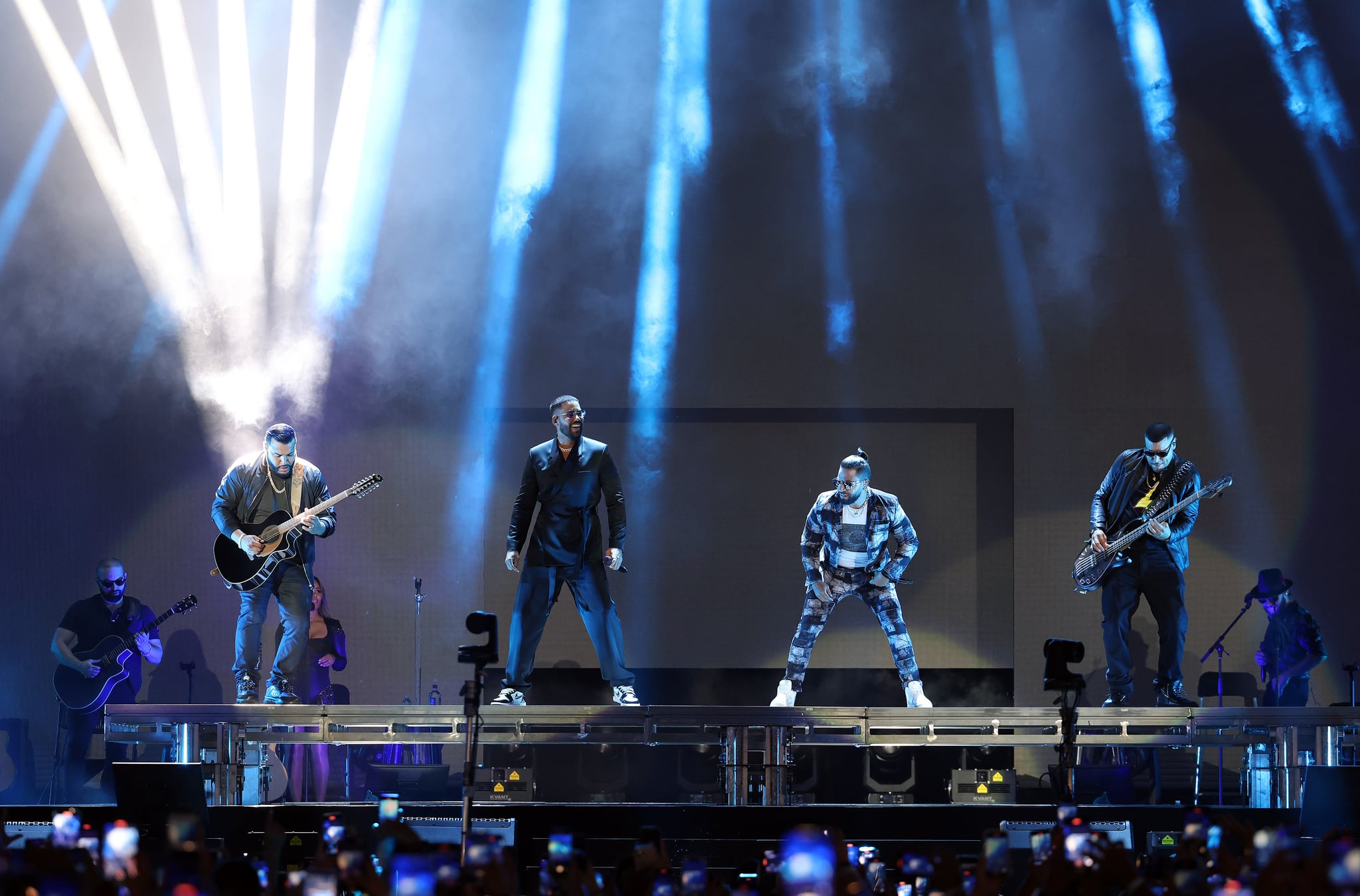   Lenny Santos, Romeo Santos, Henry Santos and Max Santos of the group Aventura perform on stage during the Inmortal Tour at Hard Rock Stadium on August 14, 2021 in Miami Gardens, Florida.  (Photo by Alexander Tamargo/Getty Images)