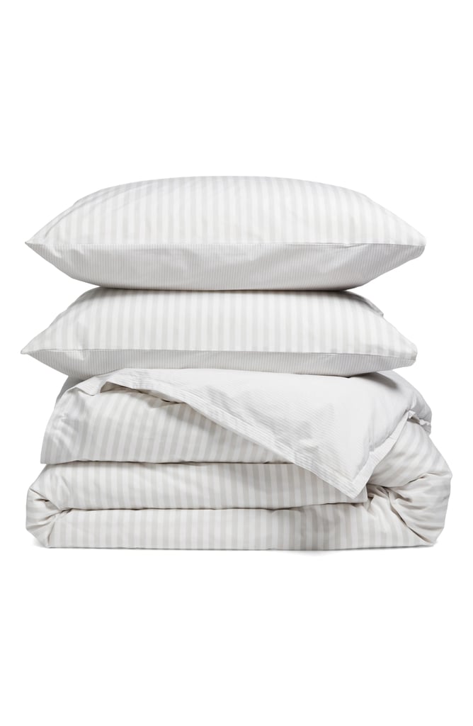 Nordstrom Reversible Stripe Cotton Percale Duvet Cover Shams Set ($71, originally $109)
So you decided you want a striped duvet cover. Do you opt for an ultra thin or chunky pattern? The beauty of this reversible set is that you don't have to choose. Mix and match the pillows and duvet to any combination you see fit.