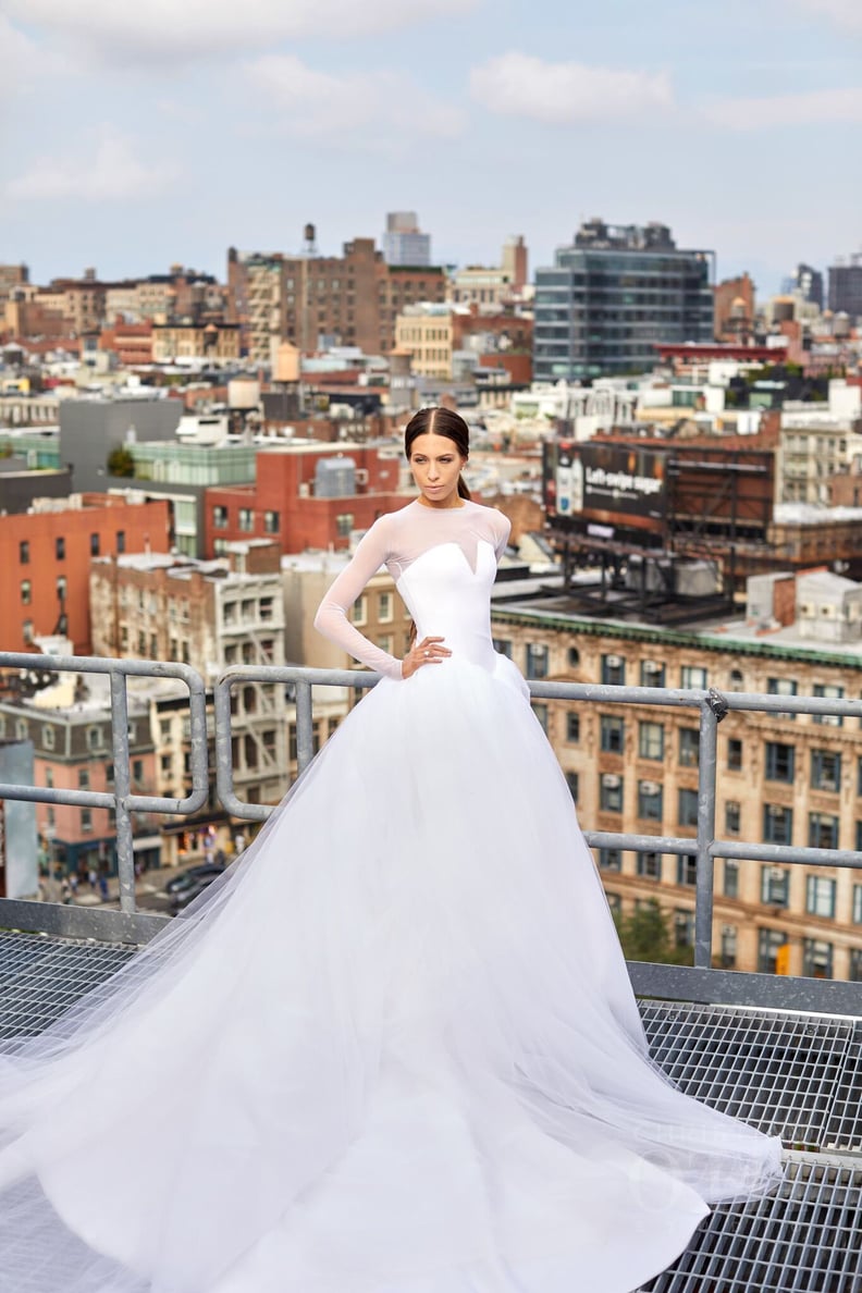 Her Long-Sleeved Dress Featured a Tulle Train