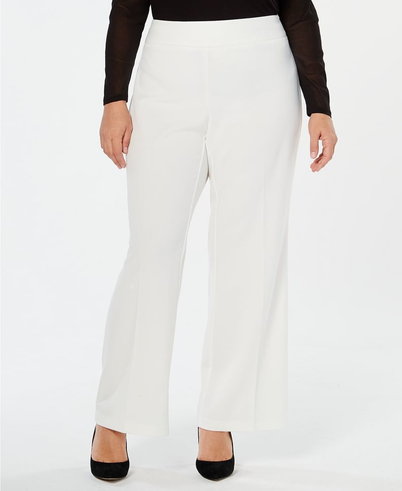 Jennifer Lopez Black Bodysuit and White Trousers | POPSUGAR Fashion