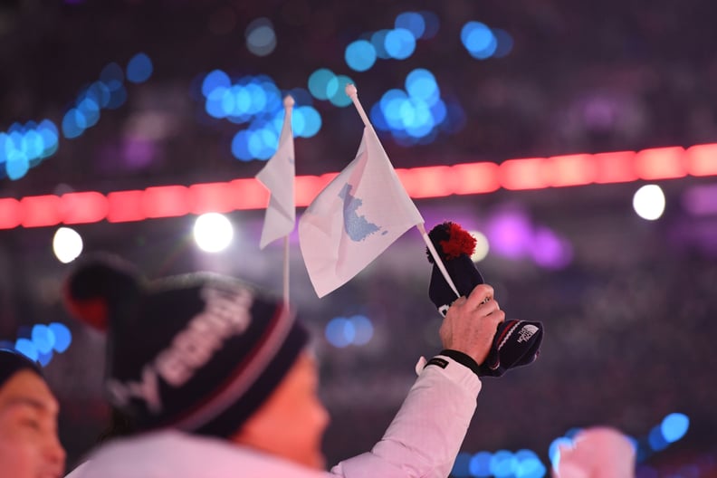 Athletes from North and South Korea waved the Unification Flag.