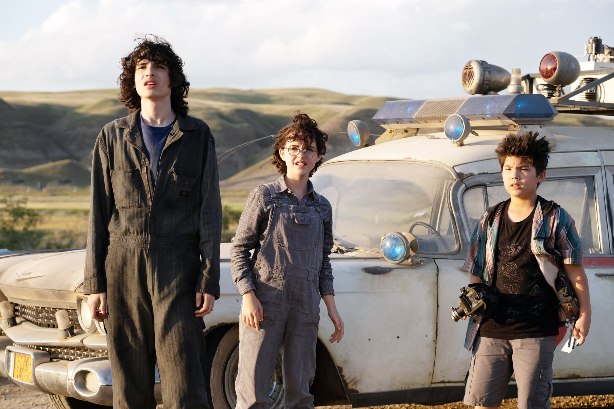 GHOSTBUSTERS: AFTERLIFE, from left: Finn Wolfhard, Mckenna Grace, Logan Kim, 2021. ph: Kimberley French /  Columbia Pictures / courtesy Everett Collection